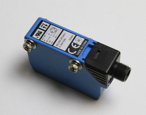 Compact SICK W250-2P2431 sensor fotoelektrik dengan cahaya merah terlihat dan nomor bagian 6044699